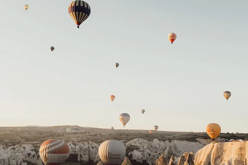 Hot air balloons above the rock formations of Cappadocia