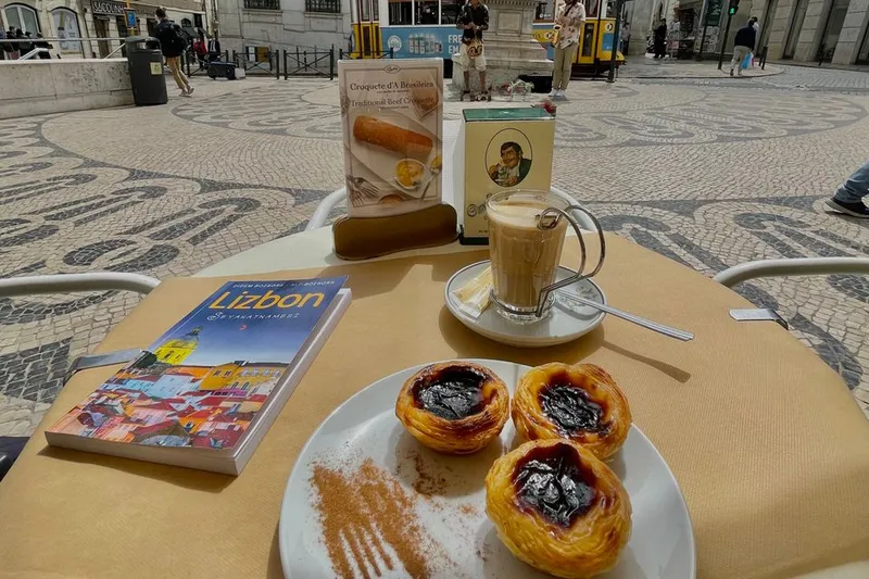 Pastéis de nata and coffee at a Lisbon café